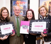 Charities share law firm cash donation