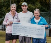 Law firm serves up ace day of tennis